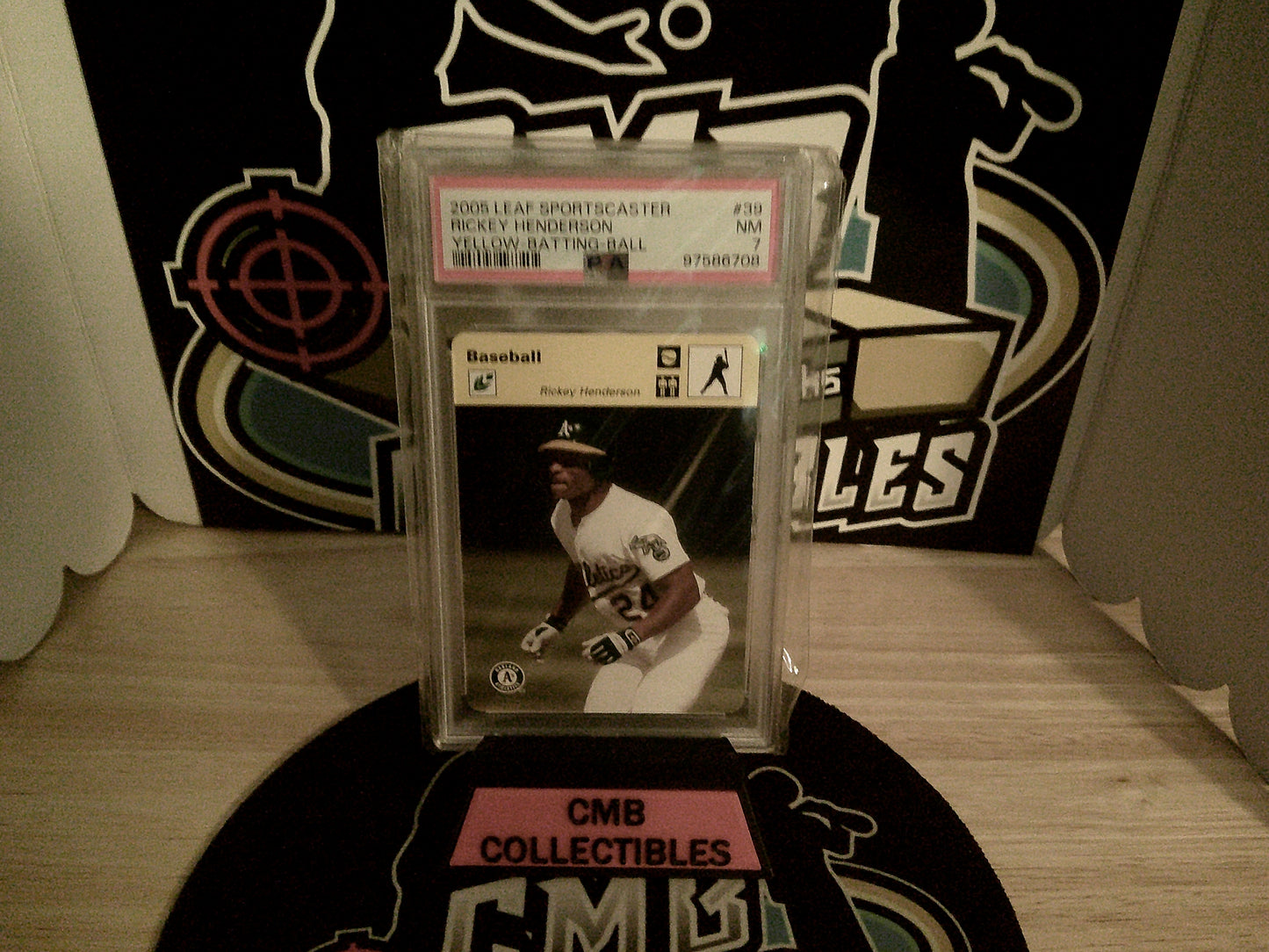 2005 Leaf Sportscaster Rickey Henderson Yellow-Batting-Ball 22/45 #39 PSA 7