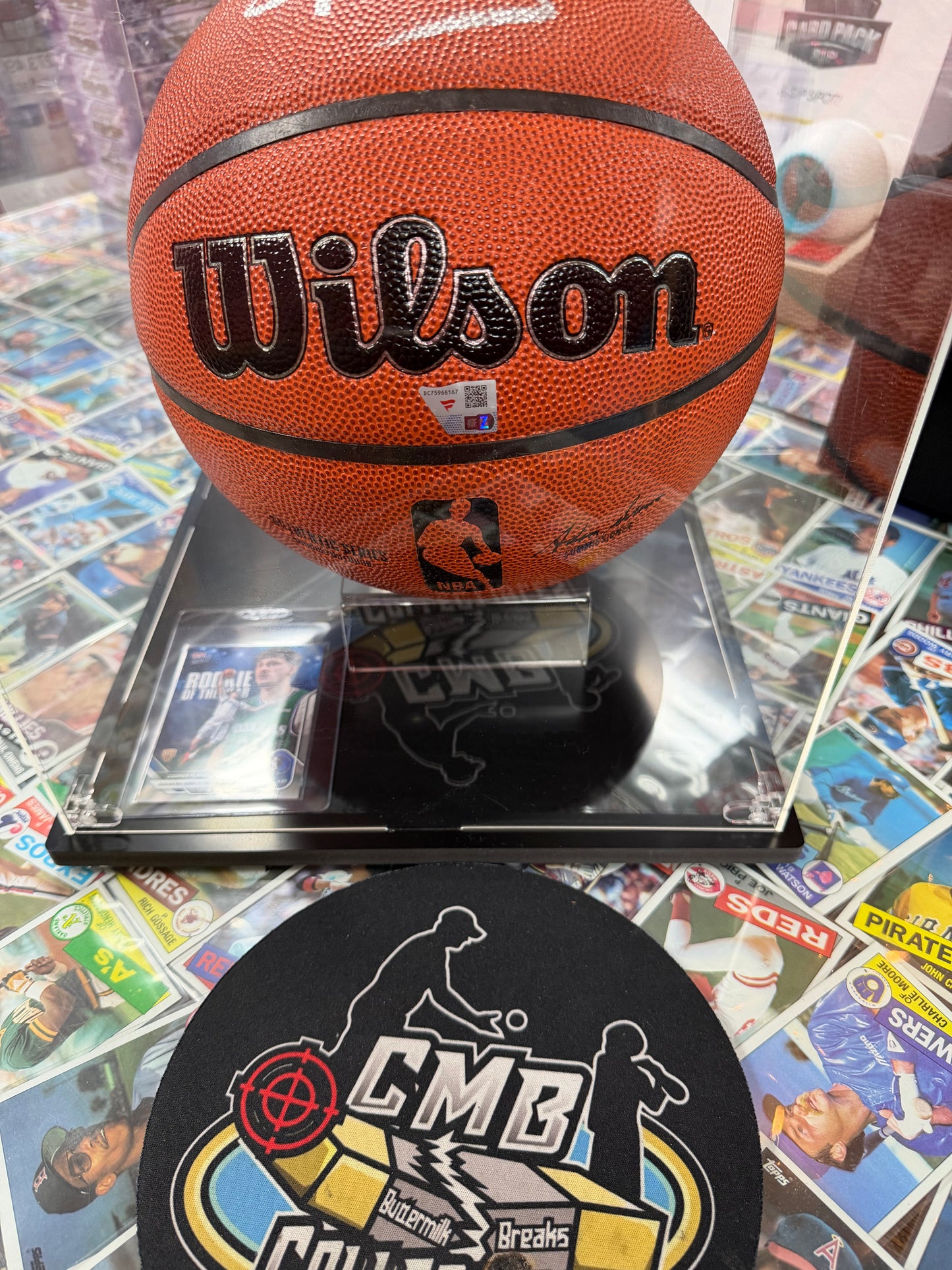 Cooper Flagg Autographed Wison Basketball Display with case and Topps Now Card. Fanatics COA.