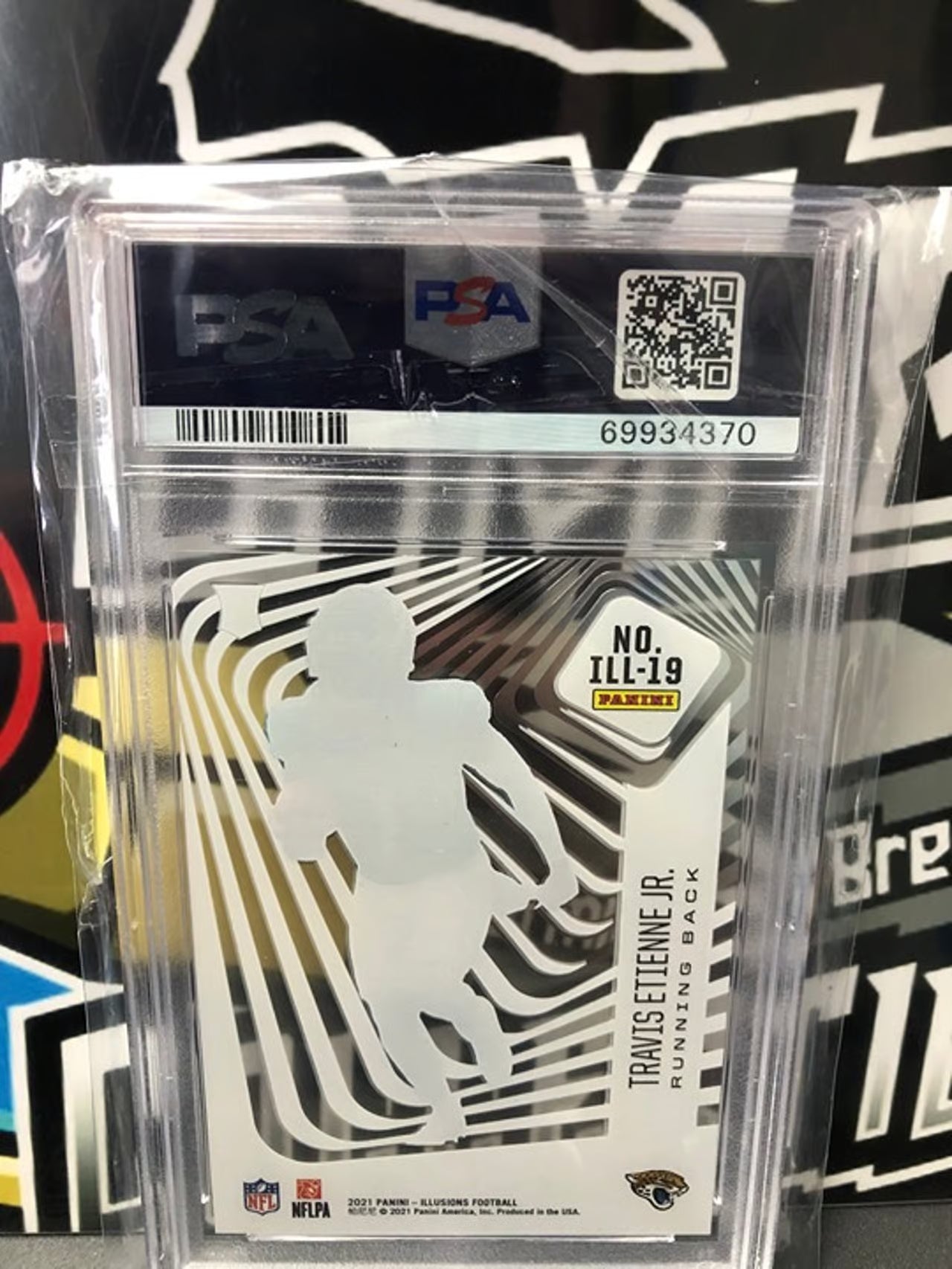 2021 Panini Illusions Travis Etienne Jr. Illusionists RC #ILL19 PSA Graded 9!